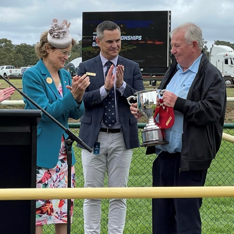 Her Excellency congratulating Ian Millard on winning the Queen of the Hills trophy at Oakbank