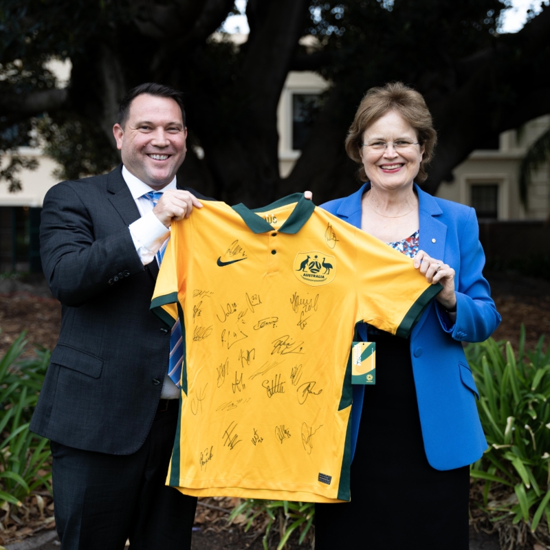 Her Excellency receiving a signed football tshirt at a reception for FIFA Womens Australia and New Zealand